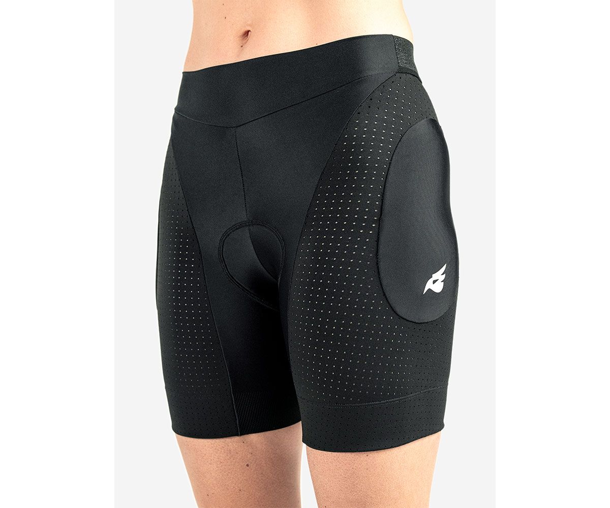 Side view of Bluegrass Aura Shorts worn by a rider, showcasing certified hip protection and breathable, stretch fabric